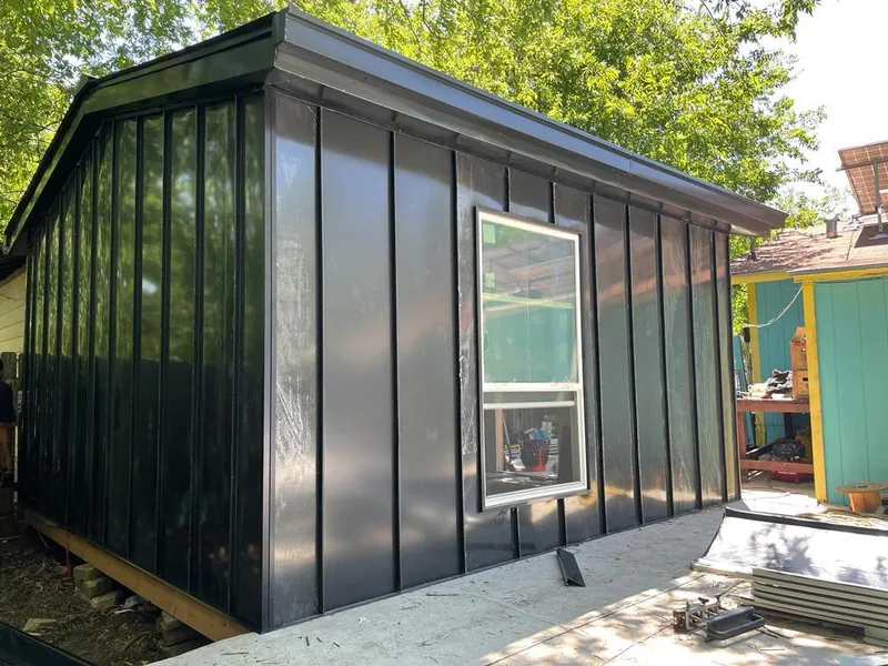 Black standing seam metal wall panels for Roof Inspection in Whitemarsh Island